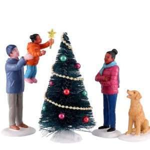 Family Placing Christmas Tree Star Miniature Figure